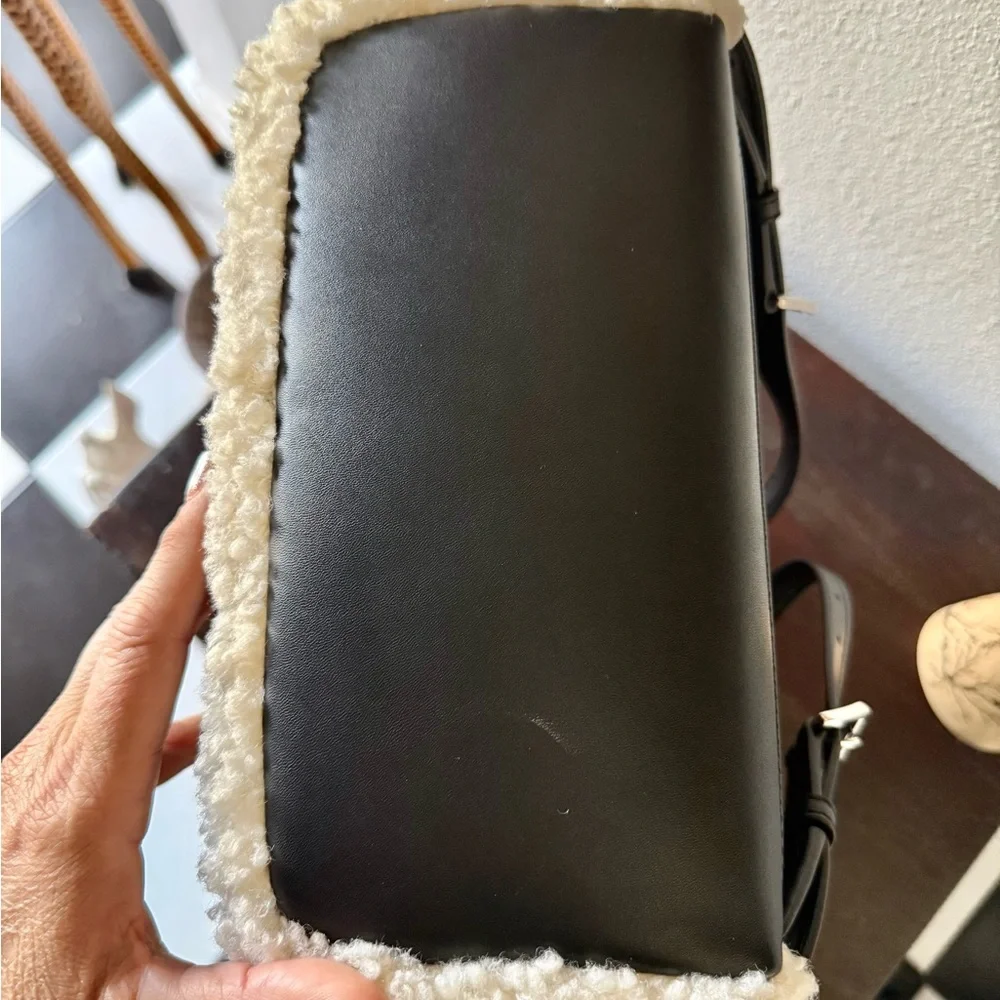 Michael Kors black and Cream Backpack is leather/ fur is faux new bag - Picture 11 of 11